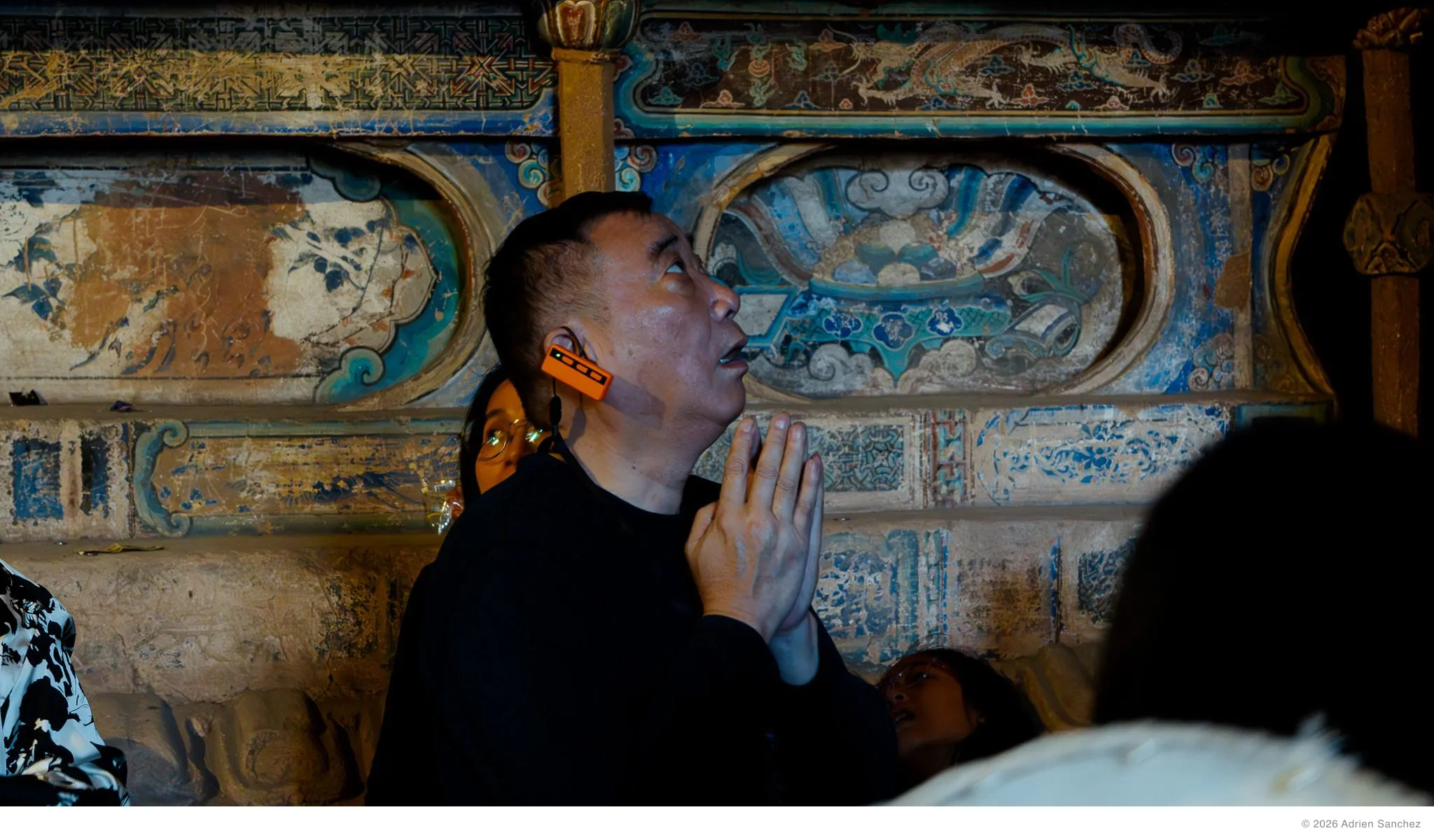 Praying in a cave