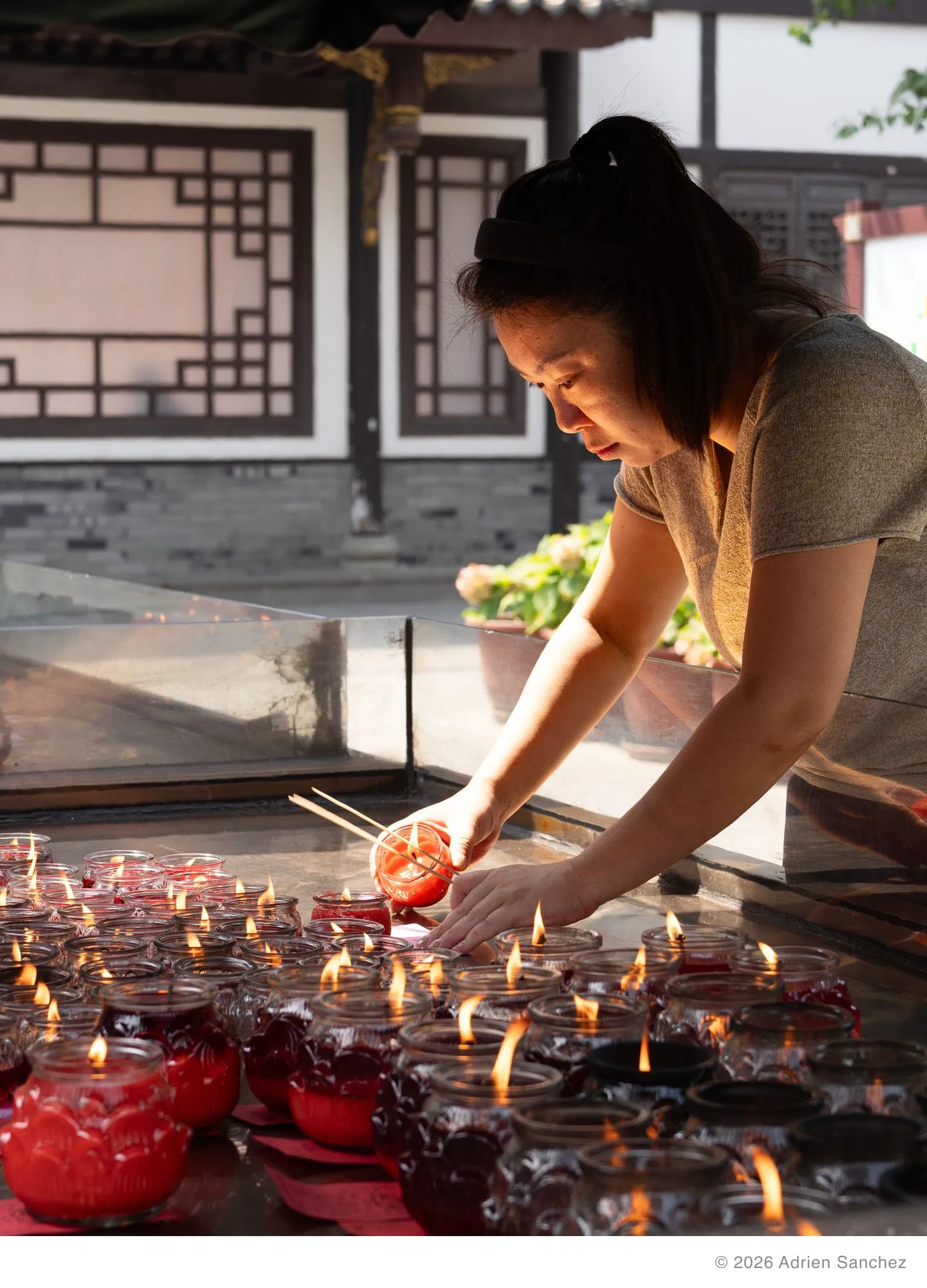 Lighting candles and incense