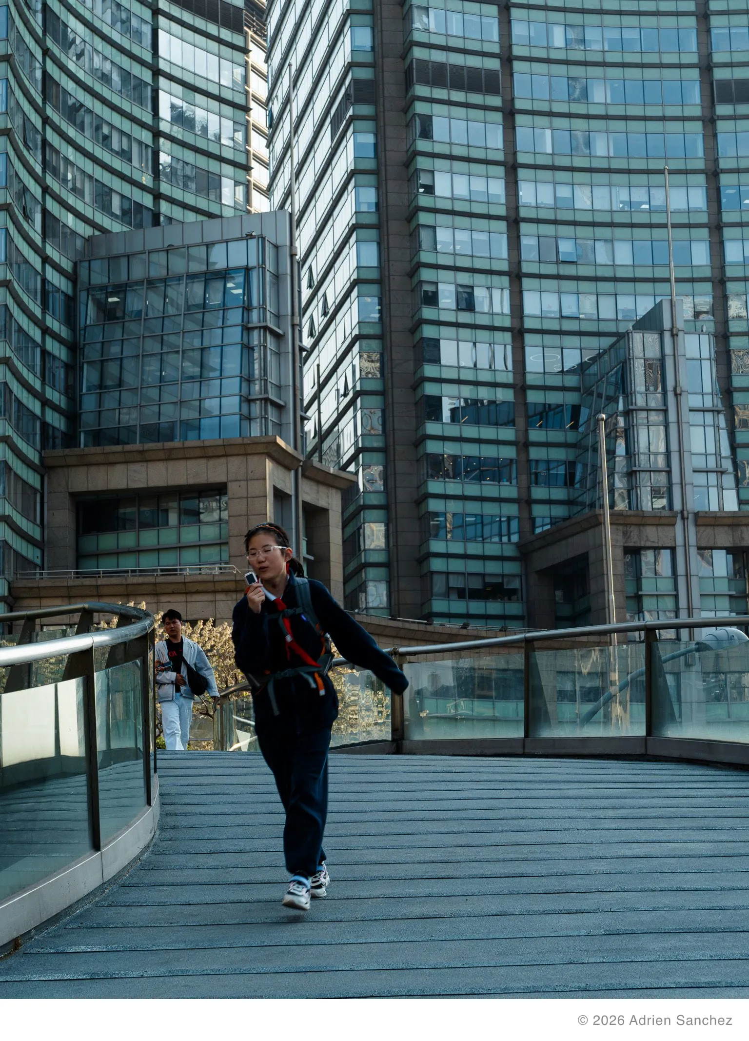 Kid between glass towers