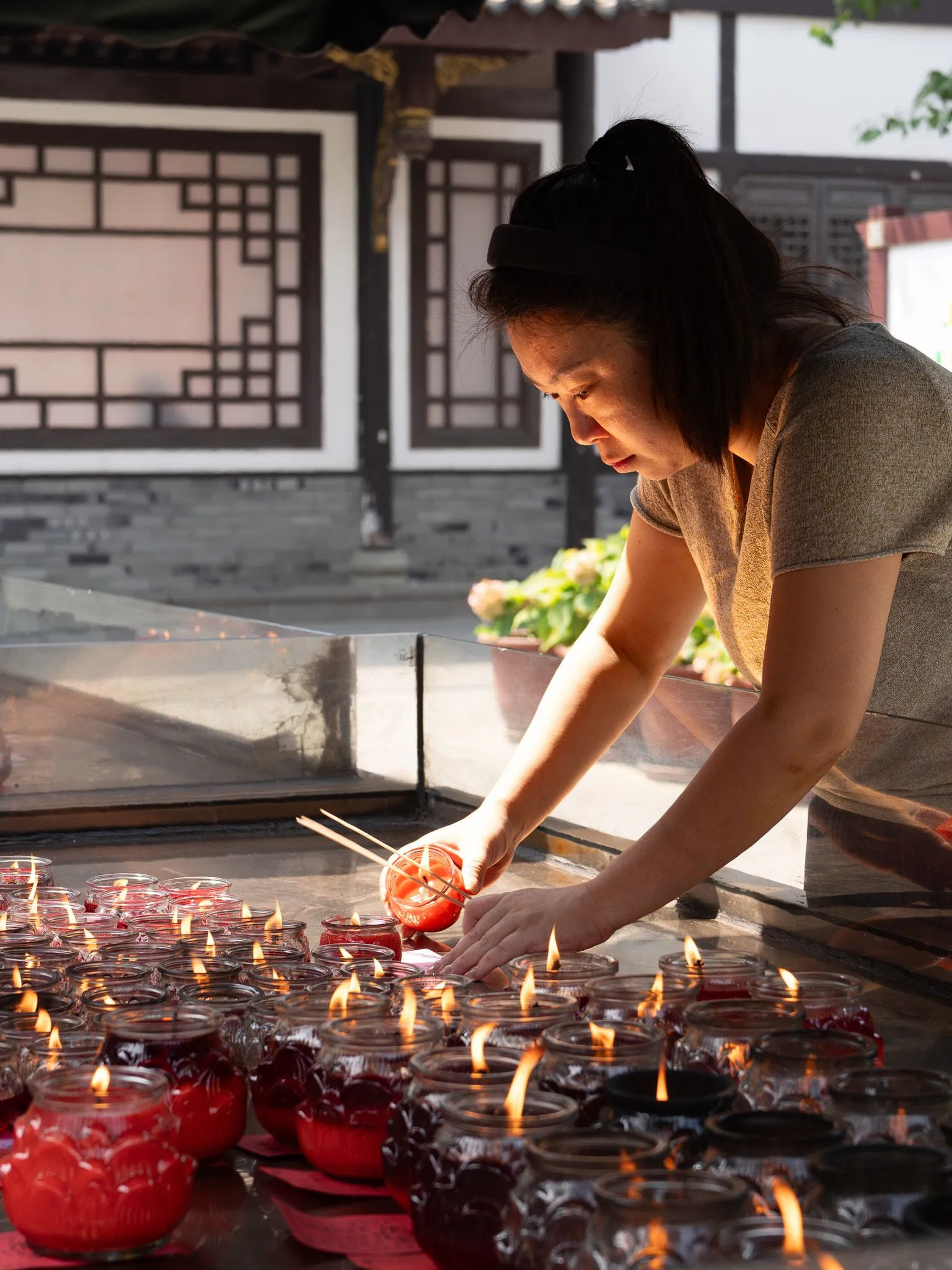 Lighting candles and incense
