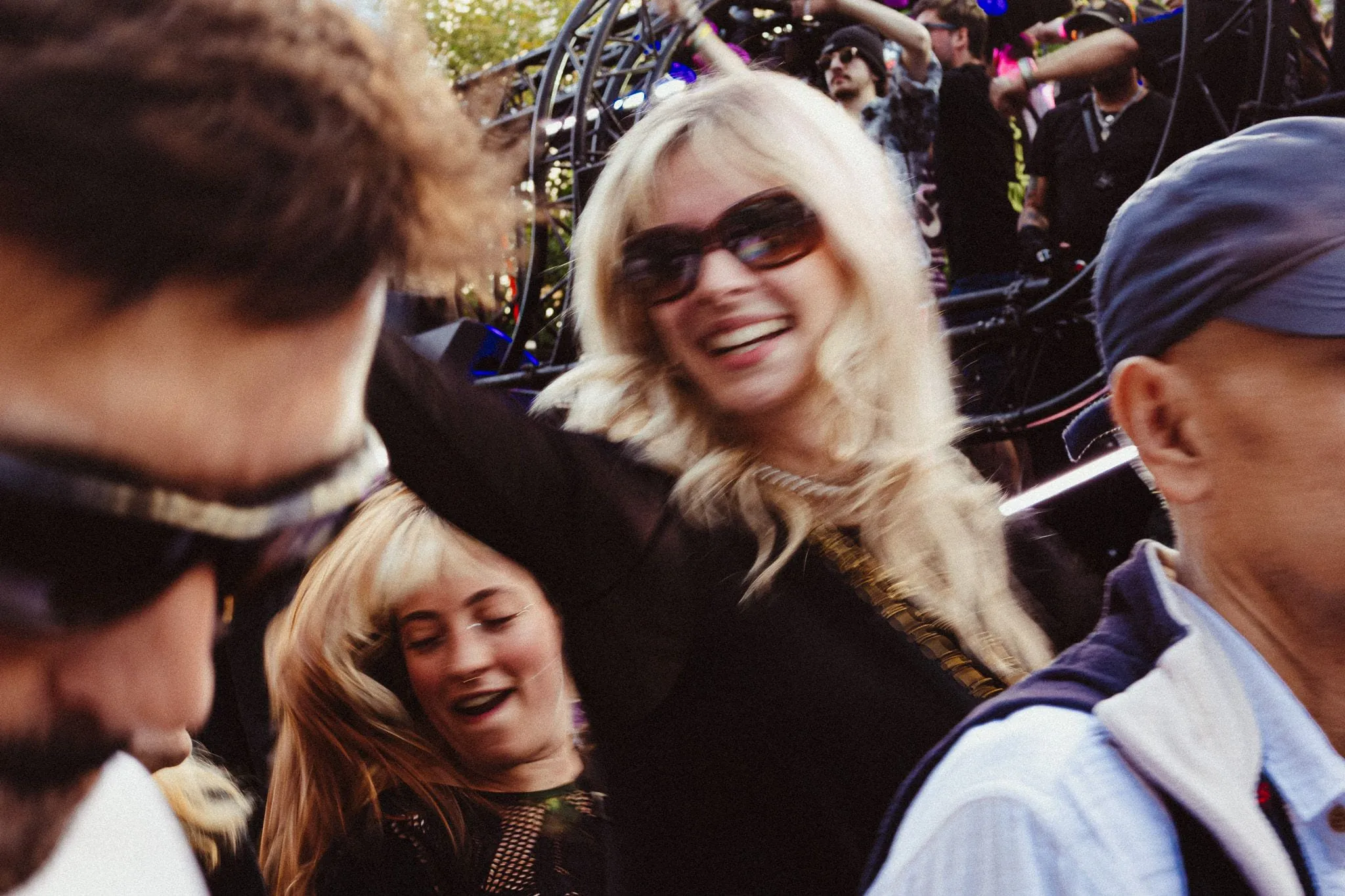 Blonde laughing by the float