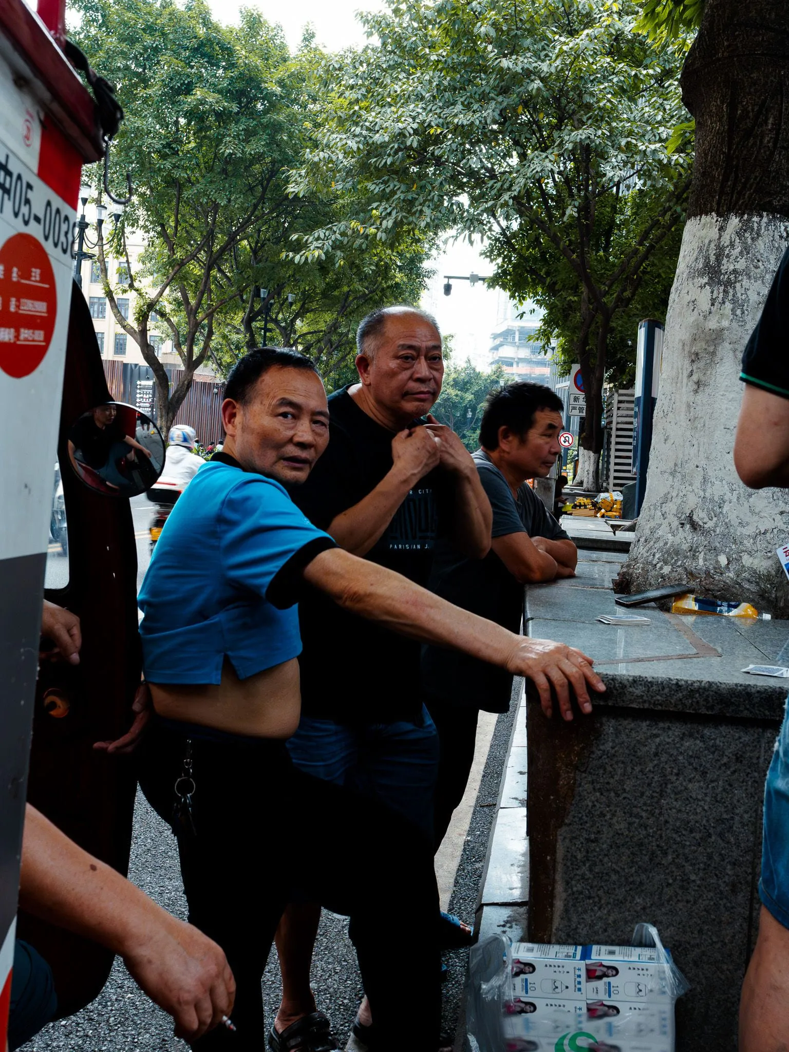 Men waiting for cards