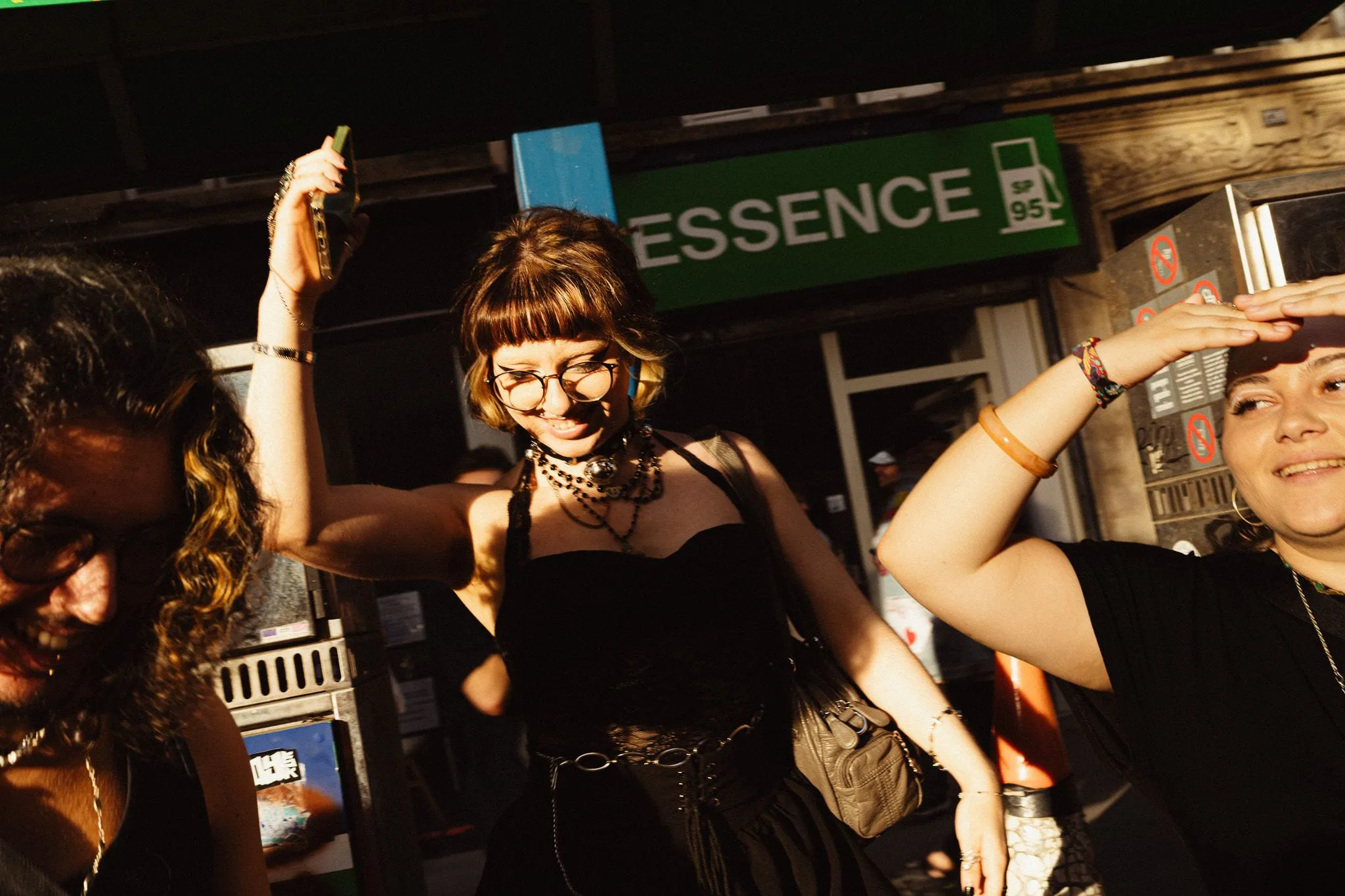 Dancing under the station sign