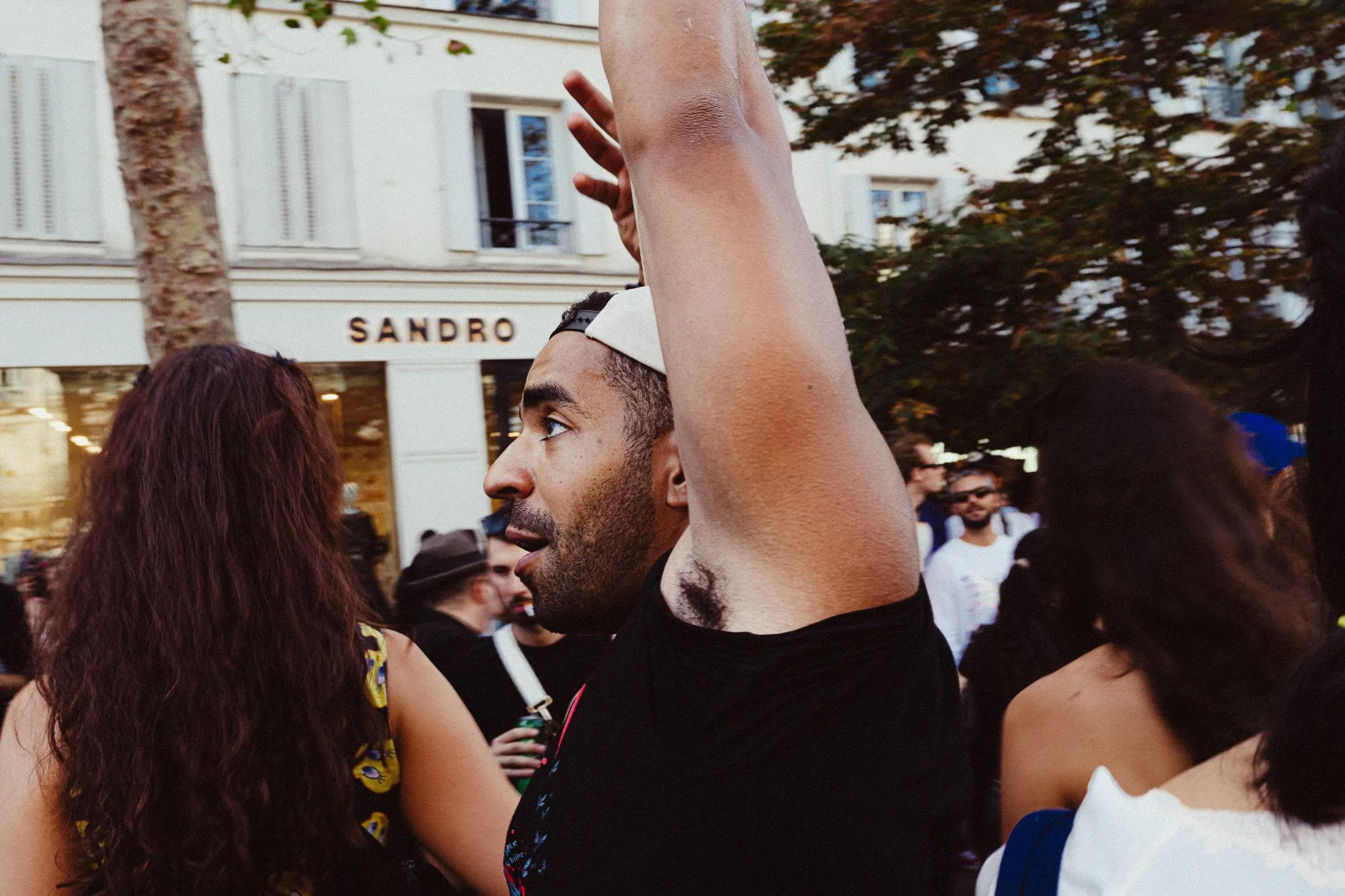 Arm raised outside the boutique